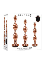 Load image into Gallery viewer, Gender X Gold Digger Set Anal Plugs - Black/Rose Gold - 3 Piece Set
