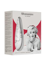 Load image into Gallery viewer, Womanizer Marilyn Monroe Special Edition Rechargeable Clitoral Stimulator - White/White Marble
